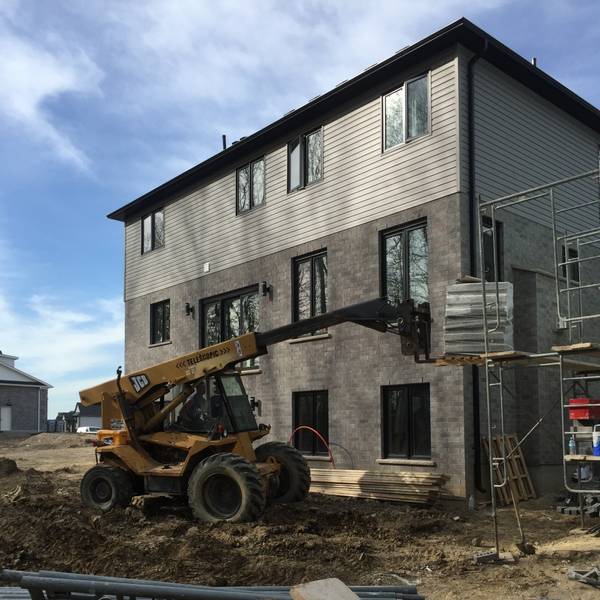 Modern multi-unit with grey brick exterior