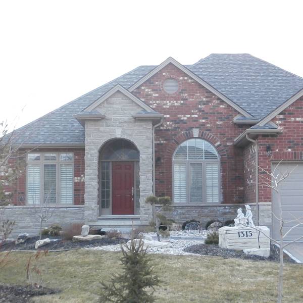 Custom residential brick and stone exterior